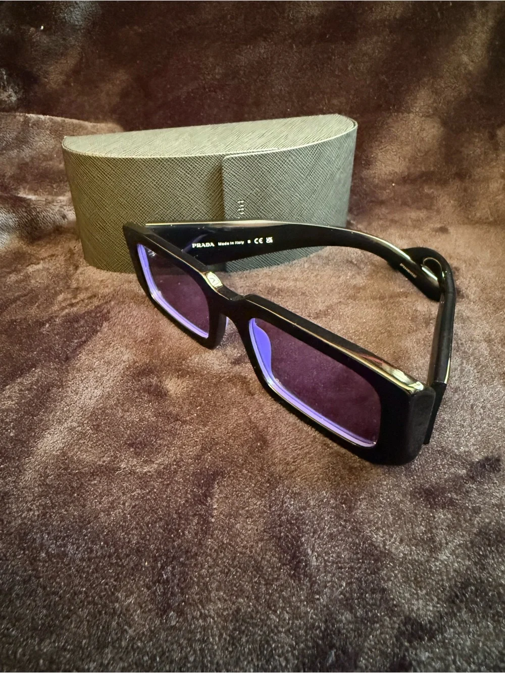 Prada Black sunglasses with violet lens